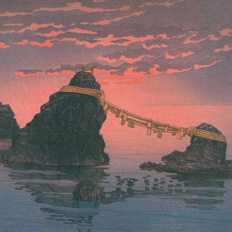 May include: A traditional Japanese Shinto shrine gate, or torii, is perched atop a rocky outcropping in the sea. The torii is connected to another rock by a rope bridge adorned with numerous small charms. The scene is bathed in a soft, pink and purple twilight sky.