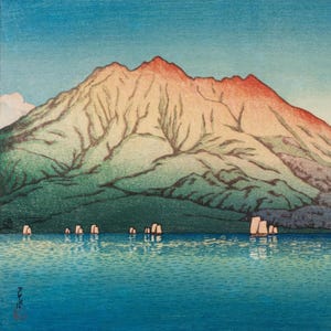 May include: A woodblock print depicting a mountain range with a red-orange peak, reflected in a still blue lake. Several small boats are visible in the water.