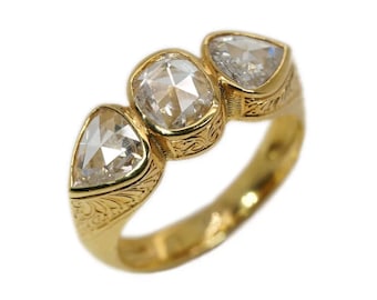 Three white rose cut diamonds 18ky gold ring