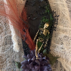 Coffin Shaped Skeleton Wall Hanger