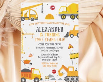 May include: Construction themed birthday party invitation with yellow and orange construction vehicles, a hard hat, and the text "STOP THE TRAFFIC AND CLOSE THE ROAD", "Alexander is turning two years old!" and "Come join the crew! Saturday, November 24, 2024 2:00 pm to 4:00 pm Alexander's House Anywhere Street Any City Avenue St 12345 RSVP to Hailey at 123-456-7890"