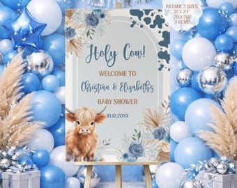 May include: A baby shower sign with the text "Holy Cow!" and "Welcome to Christian & Elizabeth's BABY SHOWER". The sign features a watercolor illustration of a Highland cow, blue floral accents, and comes in 3 sizes: 18x24, 20x30, and 24x36 inches.