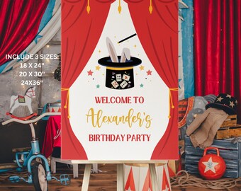 May include: A red and white birthday party sign on an easel. The sign features a magician's hat with rabbit ears, stars, and the text "Welcome to Alexander's Birthday Party." The sign is framed by red curtains. The sign is available in 3 sizes: 18 x 24", 20 x 30", and 24x36".