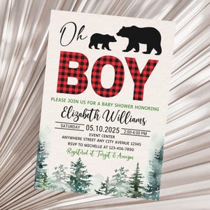 May include: A baby shower invitation with a red and black plaid pattern and the words "Oh Boy" in large letters. The invitation features a silhouette of two bears, one large and one small, and a watercolor background of a forest.