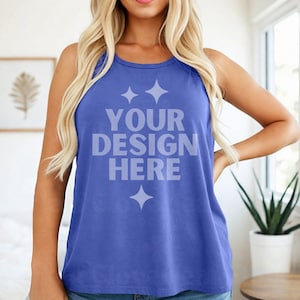 May include: A blue tank top with the text "YOUR DESIGN HERE" in a light grey font. The tank top is sleeveless and has a round neckline. The image shows a person wearing the tank top.