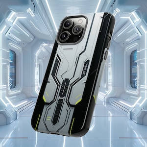 May include: A black and silver phone case with a futuristic design. The case has a textured surface and a black border. The camera lens is visible on the back of the case.