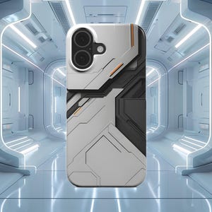 May include: A white and gray phone case with a futuristic, geometric design. The case features black and orange accents, and a dual-lens camera cutout. The overall aesthetic is reminiscent of science fiction or tech design.