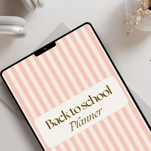 May include: A pink and white striped digital planner with the text "Back to school Planner" in gold lettering.