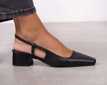 Zwarte slingback pumps: blokhak, voering van kunstleer (4 cm)