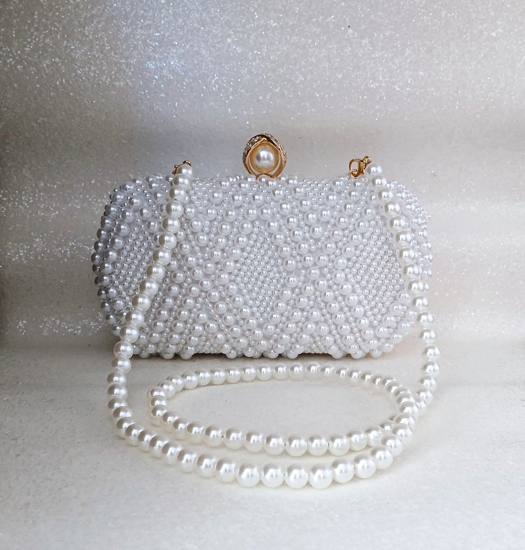 Mulmul Pearla white Clutch Bag
