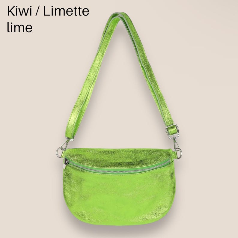 May include: A lime green leather crossbody bag with a silver zipper and strap. "Kiwi / Limette lime" is written above the bag.