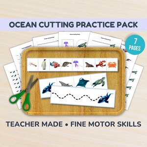May include: An Ocean Cutting Practice Pack with 7 pages of printable sheets featuring sea animal illustrations and dotted lines for cutting. Includes a pair of green-handled scissors on a wooden tray, designed for developing fine motor skills.