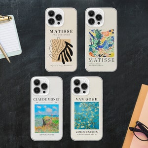May include: Four different phone cases featuring famous artists and their artwork. The cases are white with a cream background and feature the following artists: Matisse, Claude Monet, Van Gogh, and Matisse. The cases are all for the iPhone 14 Pro.