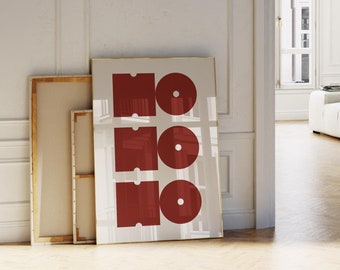 May include: A white room with a large doorway leading to another room. The doorway has a white door with a silver handle. The room has white walls and a white ceiling with ornate molding. There is a large red poster on the wall that says "HO HO HO".