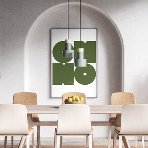 May include: A dining room with a wooden table and six chairs. The table is set with a bowl of lemons. A framed print with geometric shapes in green and white hangs on the wall. Two tall vases with dried pampas grass are on either side of the table.