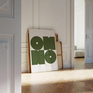 May include: A framed print with a geometric design featuring four green circles and squares on a white background.
