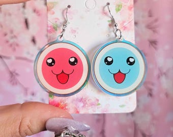 Pendientes holográficos de tambor taiko con juego de ritmo