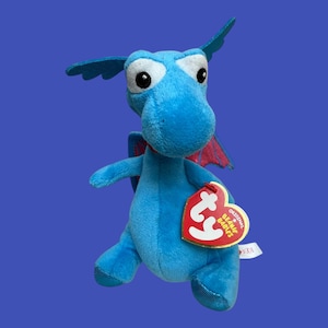 TY Beanie Babies - Stuffy the blue Dragon from the movie Doc McStuffins (7&#39;&#39;). Mint condition.