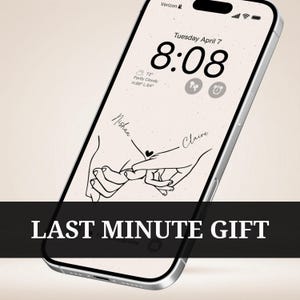 May include: A silver smartphone displays a custom lock screen with a line drawing of two hands holding pinky fingers. The screen shows the time, date, and weather. The names "Nishan" and "Claire" are written on the screen. The text "LAST MINUTE GIFT" is at the bottom.
