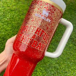 Glittered Faithful Stanley tumbler- customize any sports team- check delivery dates!!