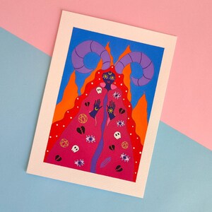 May include: A digital illustration of a person with horns and a pink cloak. The cloak is covered in symbols, eyes, and hearts. The background is blue with orange flames.