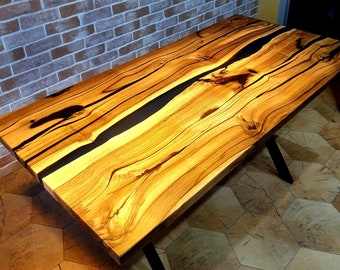 Elegante notenhouten eettafel met natuurlijk ontwerp en epoxyafwerking - Perfect voor eetruimtes en aanpasbaar naar uw smaak