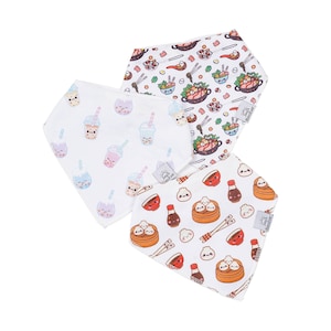 May include: Three white bandana bibs with different Asian-inspired designs. One bib features a boba tea pattern, another has a dim sum pattern, and the third has a hot pot pattern. Each bib has a small logo with the text "Baby Bib".