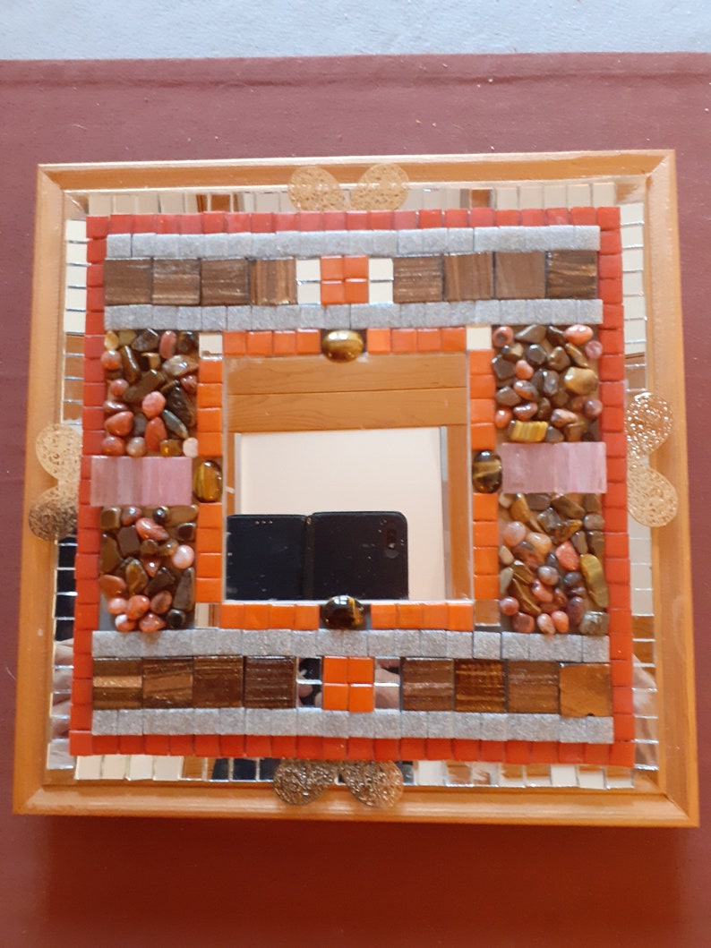 PARIS semi-precious natural stone mirror predominantly brown/red. image 1