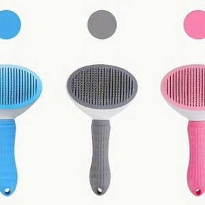 Dog grooming brush