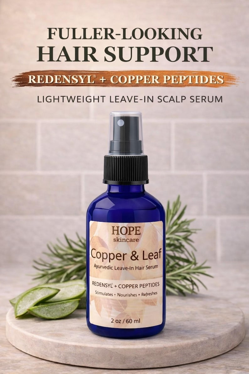 May include: A blue bottle of HOPE skincare Copper & Leaf Ayurvedic Leave-In Hair Serum. The label includes text: "Fuller-Looking Hair Support", "Redensyl + Copper Peptides", and "Lightweight Leave-In Scalp Serum". The bottle contains 2 oz / 60 ml.