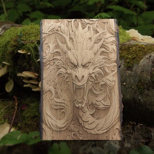 May include: A wooden plaque with a detailed carving of a dragon's head with intricate details and a fierce expression.