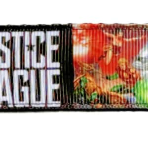 May include: A colorful Justice League key chain with a gold metal key ring. The key chain features a comic book style image of the Justice League characters.