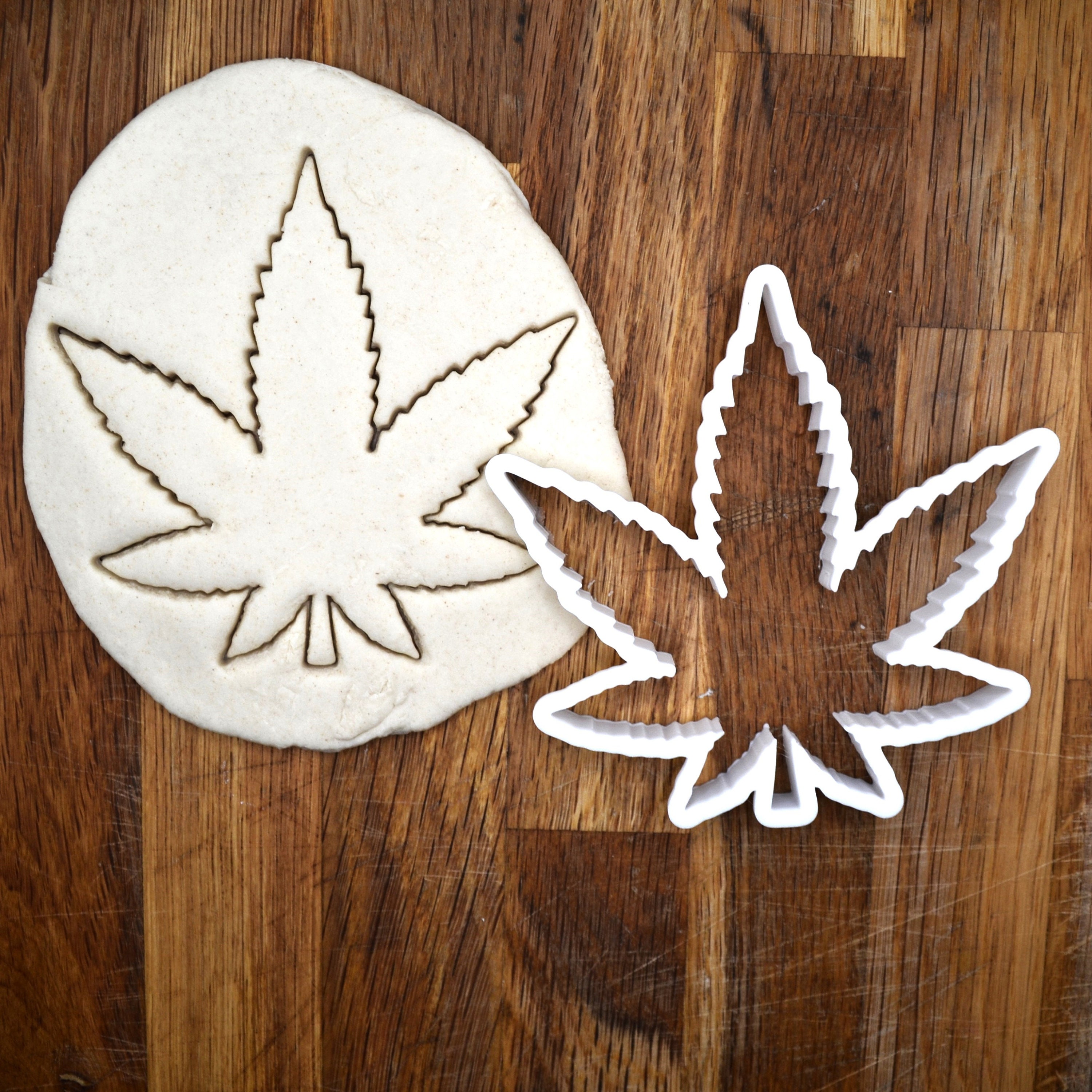 thumbnail image 2 of Marijuana Leaf Cookie Cutter: Make Fun Cannabis-Themed Treats (Multicolor Plastic) 2 of 2