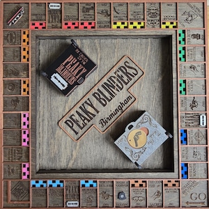 Peaky Blinders Birmingham Edition - Gioco con giradischi, salvadanaio e organizzatori di denaro