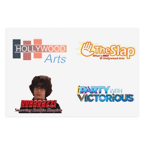 May include: Four stickers featuring logos and text. The top left sticker says "HOLLYWOOD Arts" with a color block design. The top right sticker says "The Slap" with a hand graphic. The bottom left sticker says "ROBARAZZI Starring Robbie Shapiro". The bottom right sticker says "iPARTY WITH VICTORIOUS".