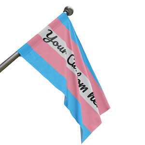 May include: A blue, pink, and white flag with the text "Your Custom Text" printed on it. The flag is hanging from a pole.