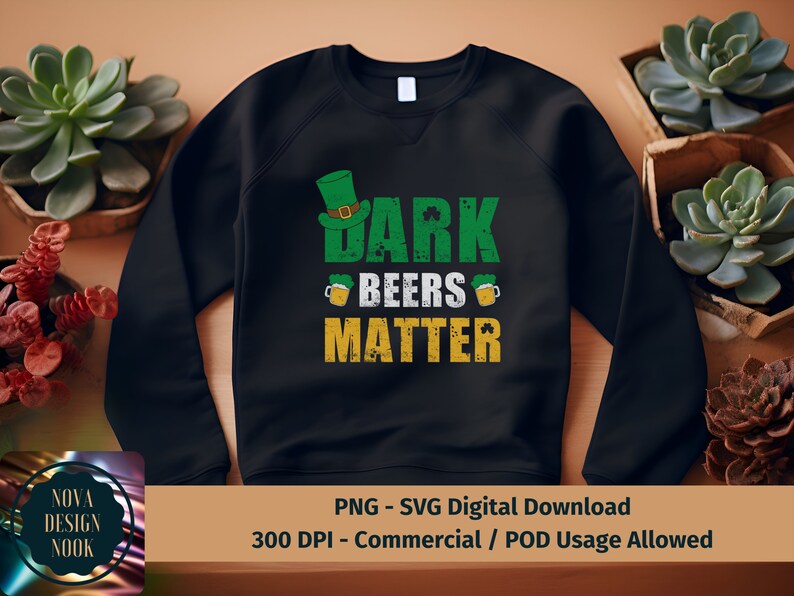 May include: Black sweatshirt with a green shamrock design and the text "Dark Beers Matter".