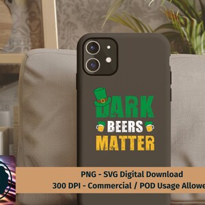 May include: A green, white, and yellow phone case with a leprechaun hat and the text "Dark Beers Matter".