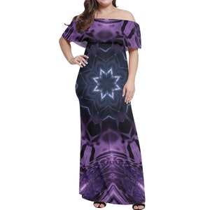 May include: Purple off-the-shoulder maxi dress with a geometric pattern featuring a large, glowing star in the center.
