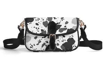 Bolso bandolera de piel vegana con estampado de vaca y cierre de solapa