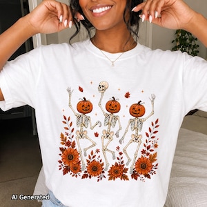 A white oversized crewneck T-shirt features the Wildflower Skeleton design in a cute spooky skeleton style.