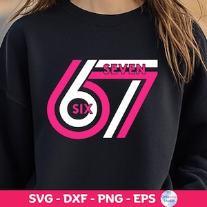 May include: Black sweatshirt with a pink and white graphic design. The design features the number 67 with the word "SIX" inside the 6 and the word "SEVEN" above the 7. The bottom of the image shows "SVG - DXF - PNG - EPS".