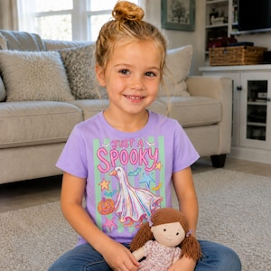Halloween Goose shown on a kids lavender short sleeve t-shirt.
A playful ghost goose design with stripes for cute Halloween family outfits.