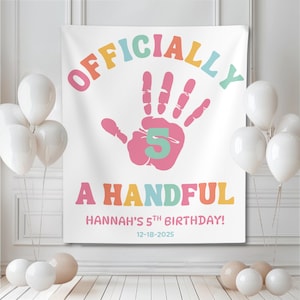 May include: A white banner with the words "OFFICIALLY" in orange, pink, yellow, and blue, and "A HANDFUL" in pink, orange, yellow, and blue. A pink handprint with the number 5 in green is in the center. The text "HANNAH'S 5TH BIRTHDAY!" and the date 12-18-2025 are below.