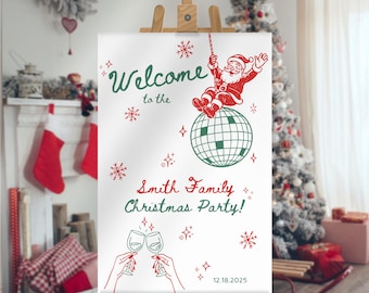 May include: A white sign on a wooden easel with green and red Christmas-themed graphics. The sign reads "Welcome to the Smith Family Christmas Party!" with a Santa Claus illustration and the date 12.18.2025. Festive snowflakes and champagne glasses are also featured.