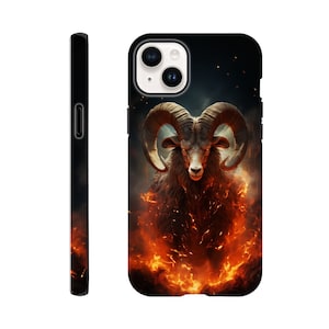 May include: A black phone case featuring a fiery image of a ram with large horns. The ram is standing in a bed of flames.