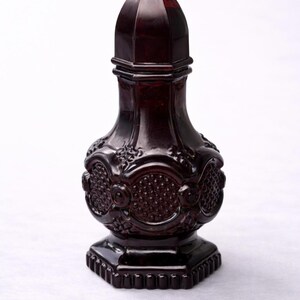 May include: A set of three ceramic mugs with a speckled, matte finish. The mugs are in shades of cream, light gray, and dark gray. Each mug has a simple, minimalist design, perfect for coffee or tea.