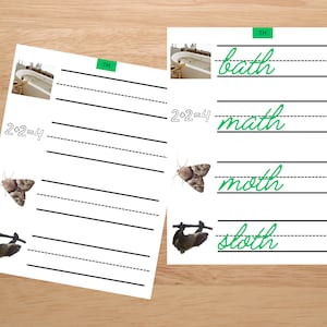 May include: Two worksheets with black and white lines and images of a bathtub, a moth, a sloth, and a math equation. The worksheets are labeled "TH" and have the words "bath", "math", "moth", and "sloth" written in cursive on them.