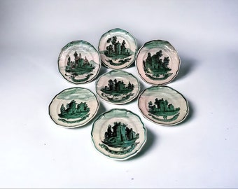 Seven decorative hand-painted ceramic plates, G.G. Italy, 30s.
