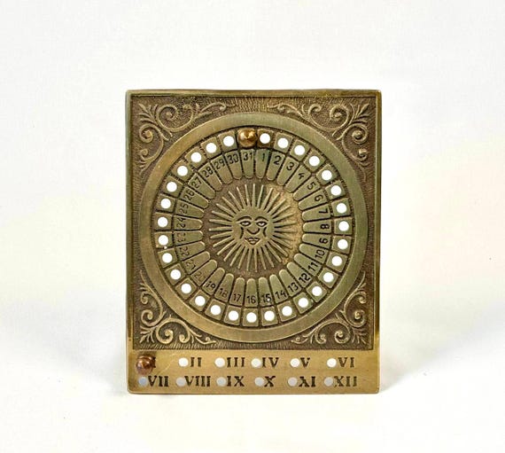 ヴィンテージ真鍮製パーペチュアルカレンダー、太陽モチーフ、占星術